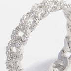 925 Sterling Silver Zircon Inlaid Ring featuring sparkling zircon stones and intricate silver detailing.