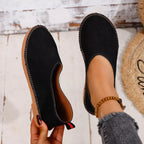 Shopimist round toe flats slip-ons with smooth leather exterior and comfortable flat sole, shown in a neutral color.