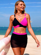 Women's two-tone cami and skort swim set by Trendsi, featuring stylish two-piece swimwear with a fitted cami top and matching skort.