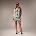 Solid color fitted mini skirt by FitiqueFit, casual street style bodycon skirt shown on a model.