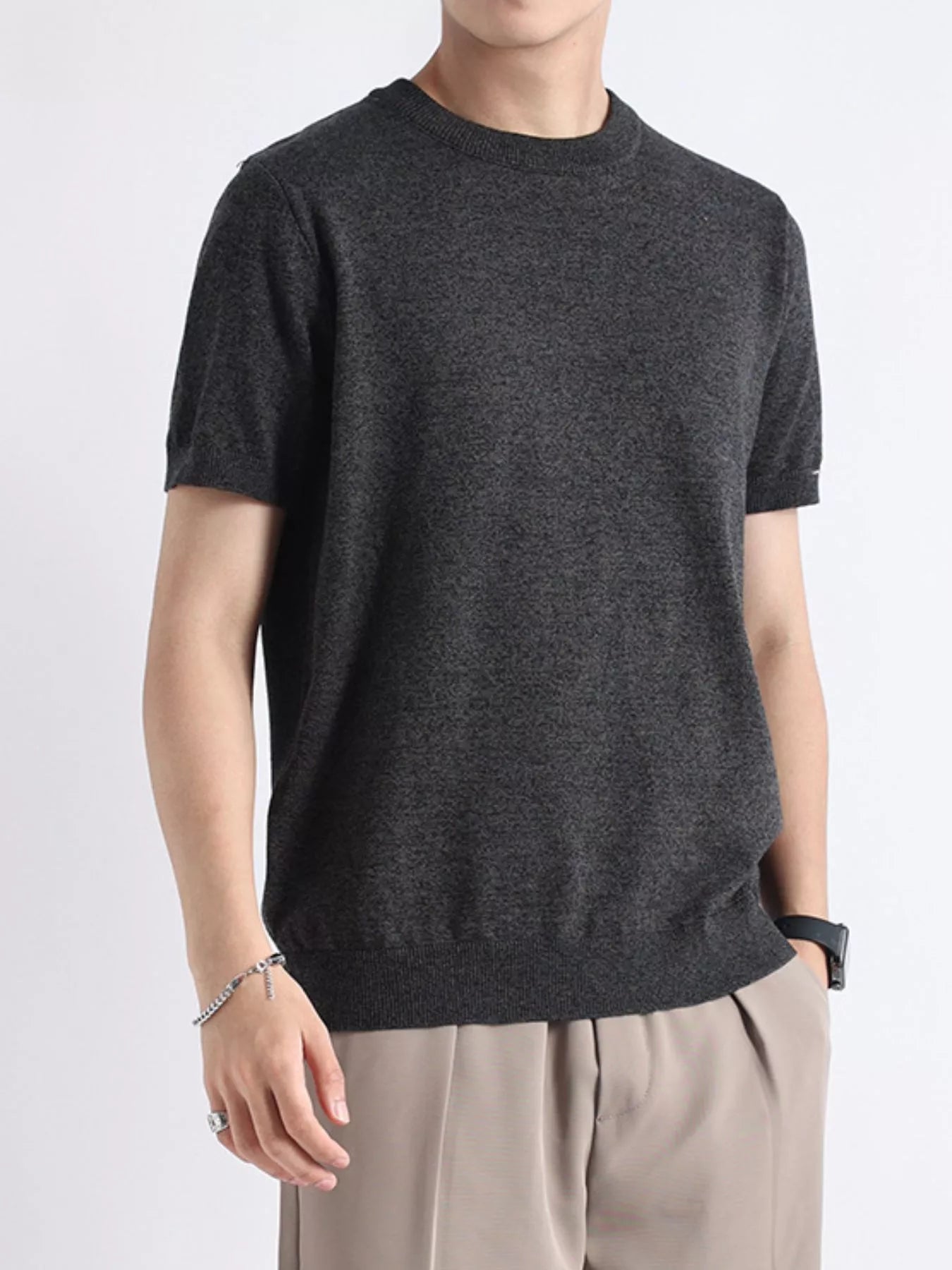 Plus size men's casual knitted short sleeve T-shirt from Trendsi, featuring a comfortable, stylish knit design in a relaxed fit.