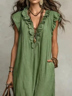 Full size ruffled v-neck cap sleeve maxi dress by Plush Fashion Hub, featuring a flowing silhouette and elegant ruffle details.
