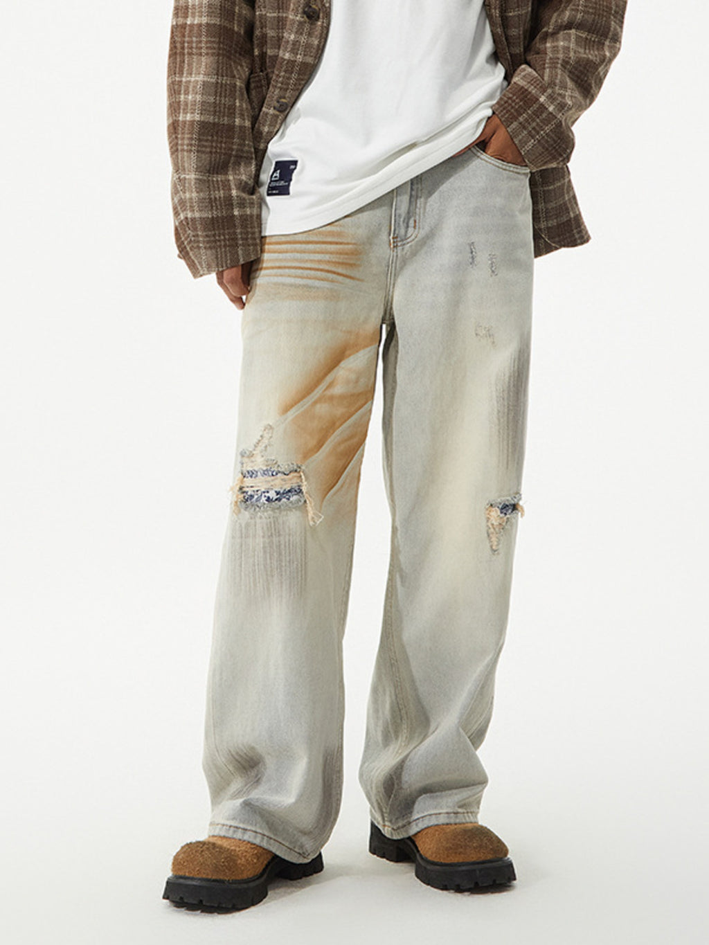 Men's distressed wide leg jeans from Trendsi, featuring a relaxed fit, rugged distressed details, and a modern wide leg silhouette.
