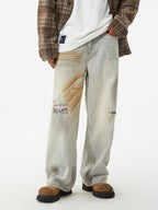 Men's distressed wide leg jeans from Trendsi, featuring a relaxed fit, rugged distressed details, and a modern wide leg silhouette.