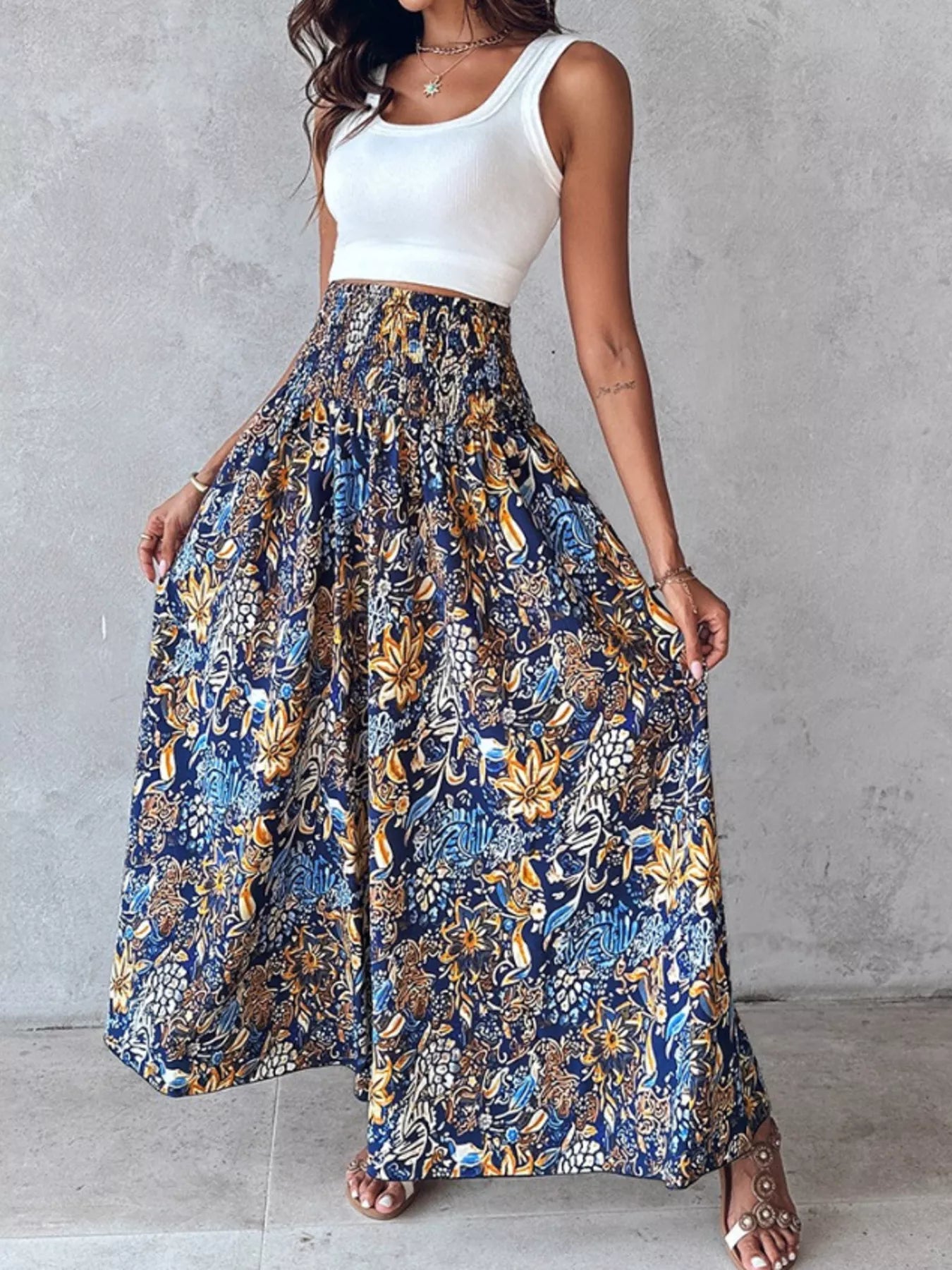 Printed wide-leg pants by Shopimist featuring a flowy design and bold print, shown on a model against a neutral background.