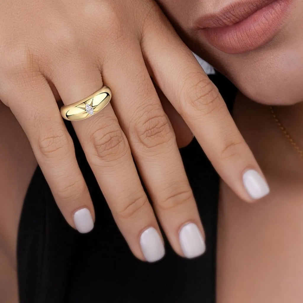 925 Sterling Silver Moissanite Ring featuring a sparkling central stone and intricate band design.