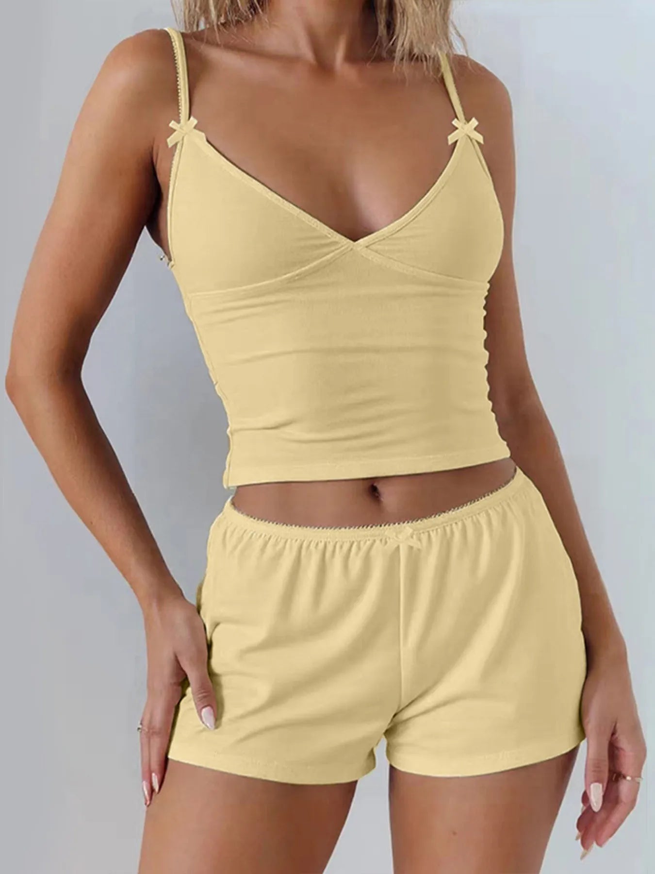 Trendsi active wear V-neck cami and matching shorts set, lightweight fabric, perfect for gym or casual wear.
