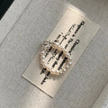 Shopimist bow pearl beaded ring featuring a delicate design with pearls and beaded accents on a silver band.