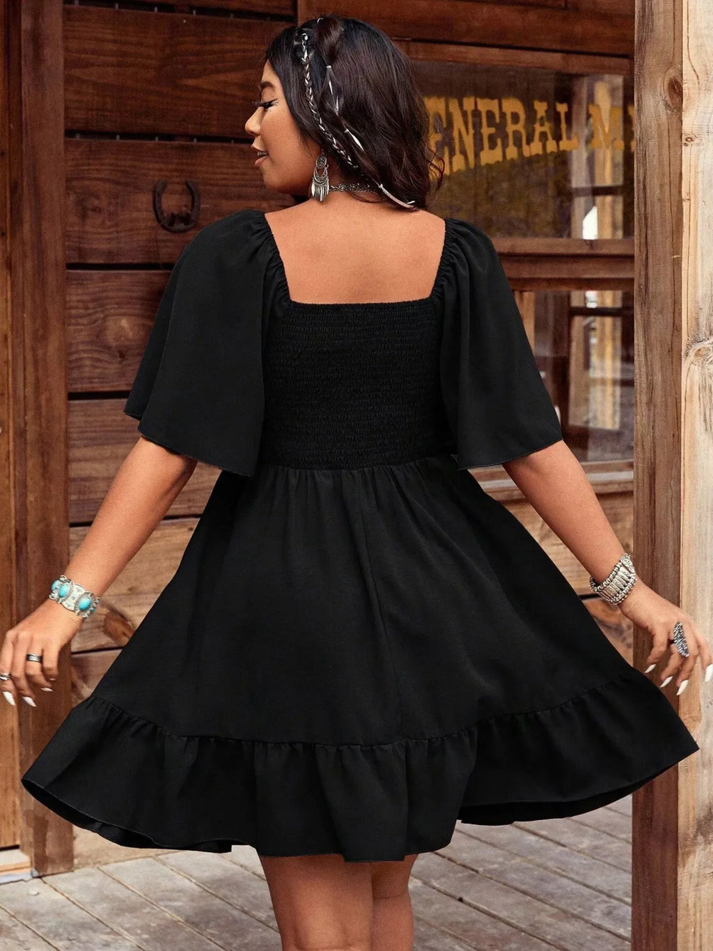 Embroidered flutter sleeve mini dress by Shopimist featuring delicate embroidery, lightweight fabric, and a stylish, feminine silhouette.