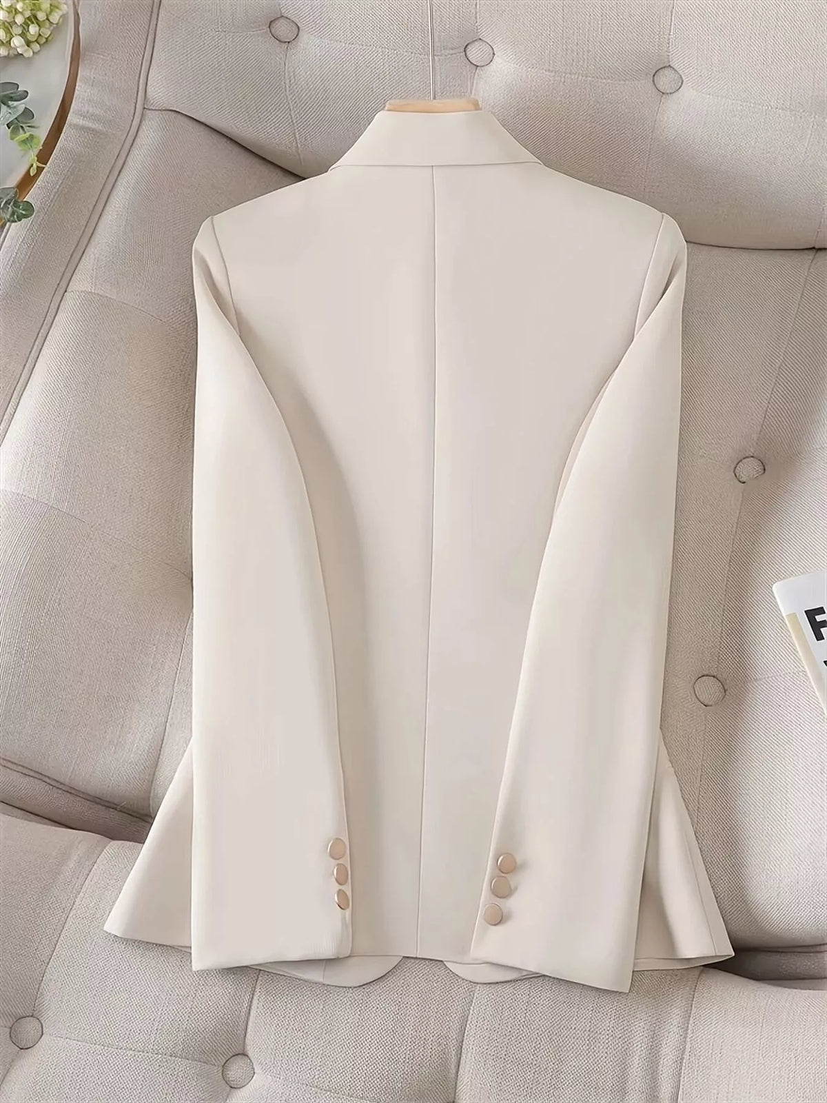 Slim-fit single-button blazer by Trendsi, tailored fit with notch lapel, shown in a sleek, dark fabric front view.