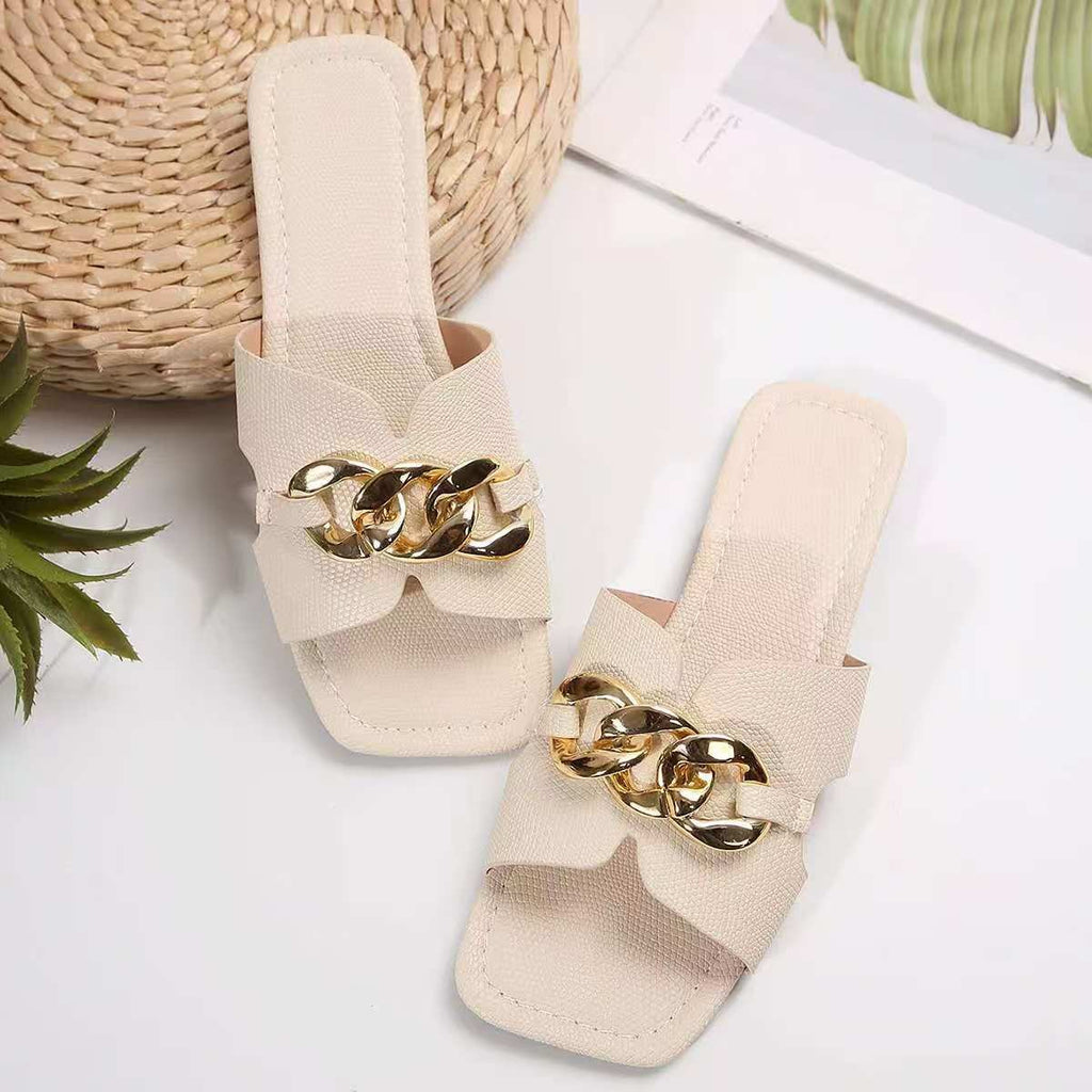 Chain embellished slide sandals by Plush Fashion Hub featuring comfortable open-toe design and stylish chain accents.