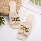 Chain embellished slide sandals by Plush Fashion Hub featuring comfortable open-toe design and stylish chain accents.