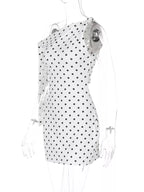 Polka dot sleeveless mini dress with bow accents, stylish Shopimist dress perfect for summer fashion.