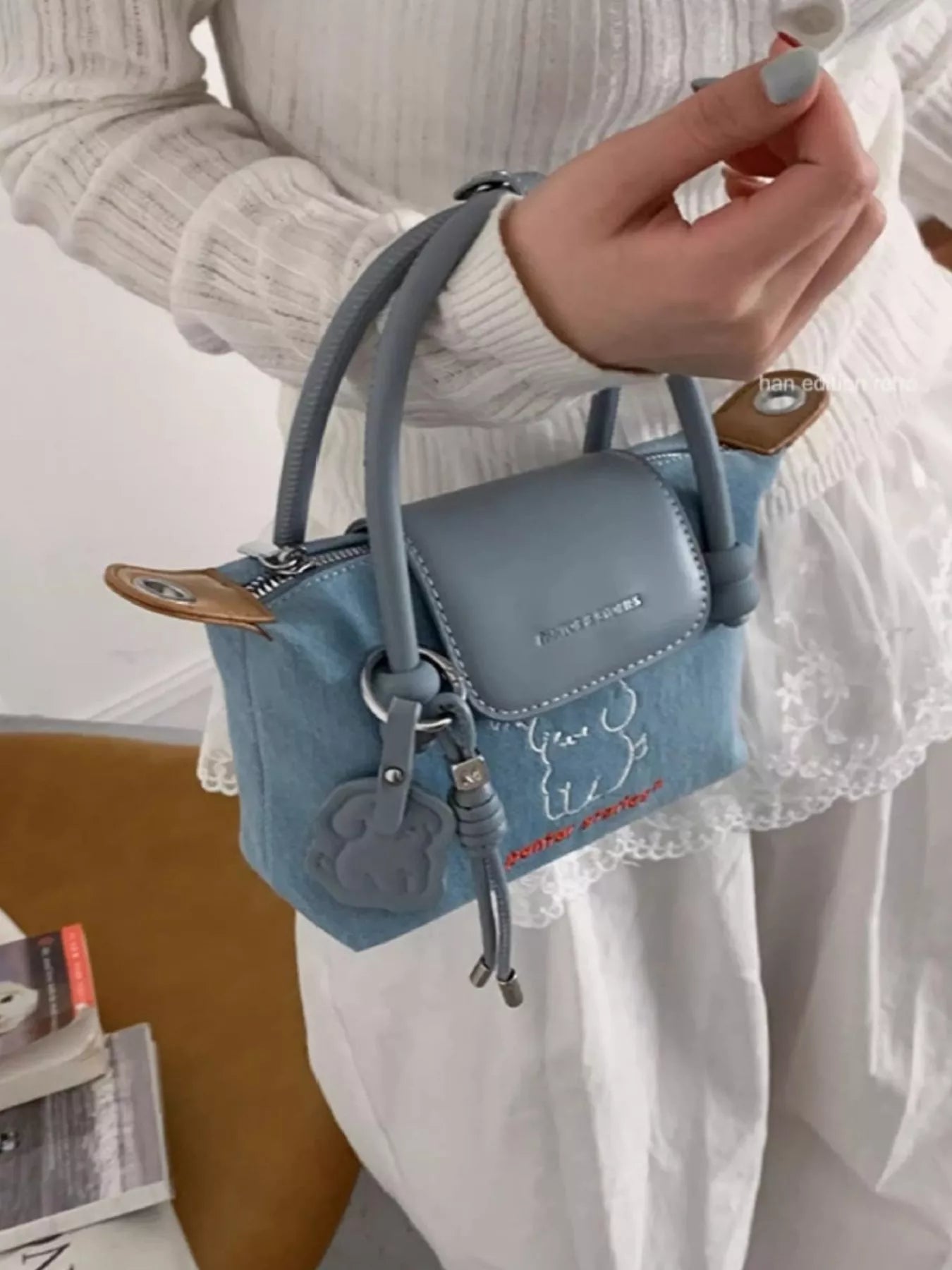 Denim handbag by Shopimist featuring puppy embroidery and embroidered details, stylish and casual accessory for everyday use.