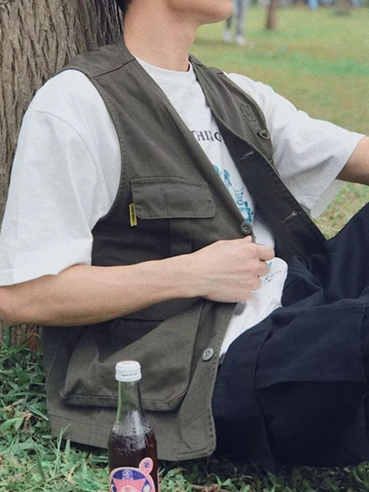 Men's multi-pocket cargo vest by Plush Fashion Hub featuring multiple functional pockets and durable fabric for outdoor wear.