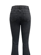 Plush Fashion Shop denim flare jeans with front and back pockets, fitted at the waist and flaring at the legs, casual and stylish.