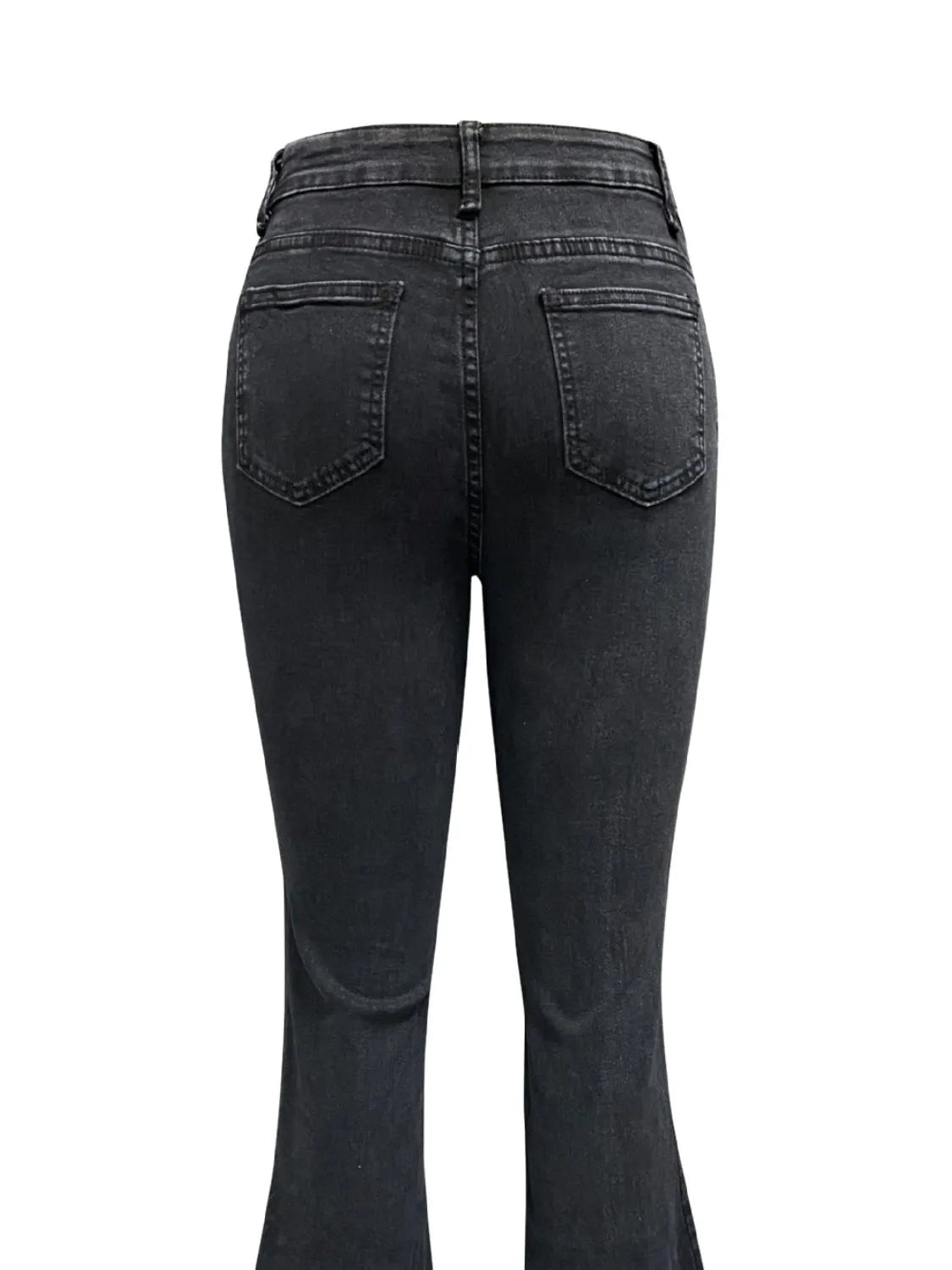 Plush Fashion Shop denim flare jeans with front and back pockets, fitted at the waist and flaring at the legs, casual and stylish.