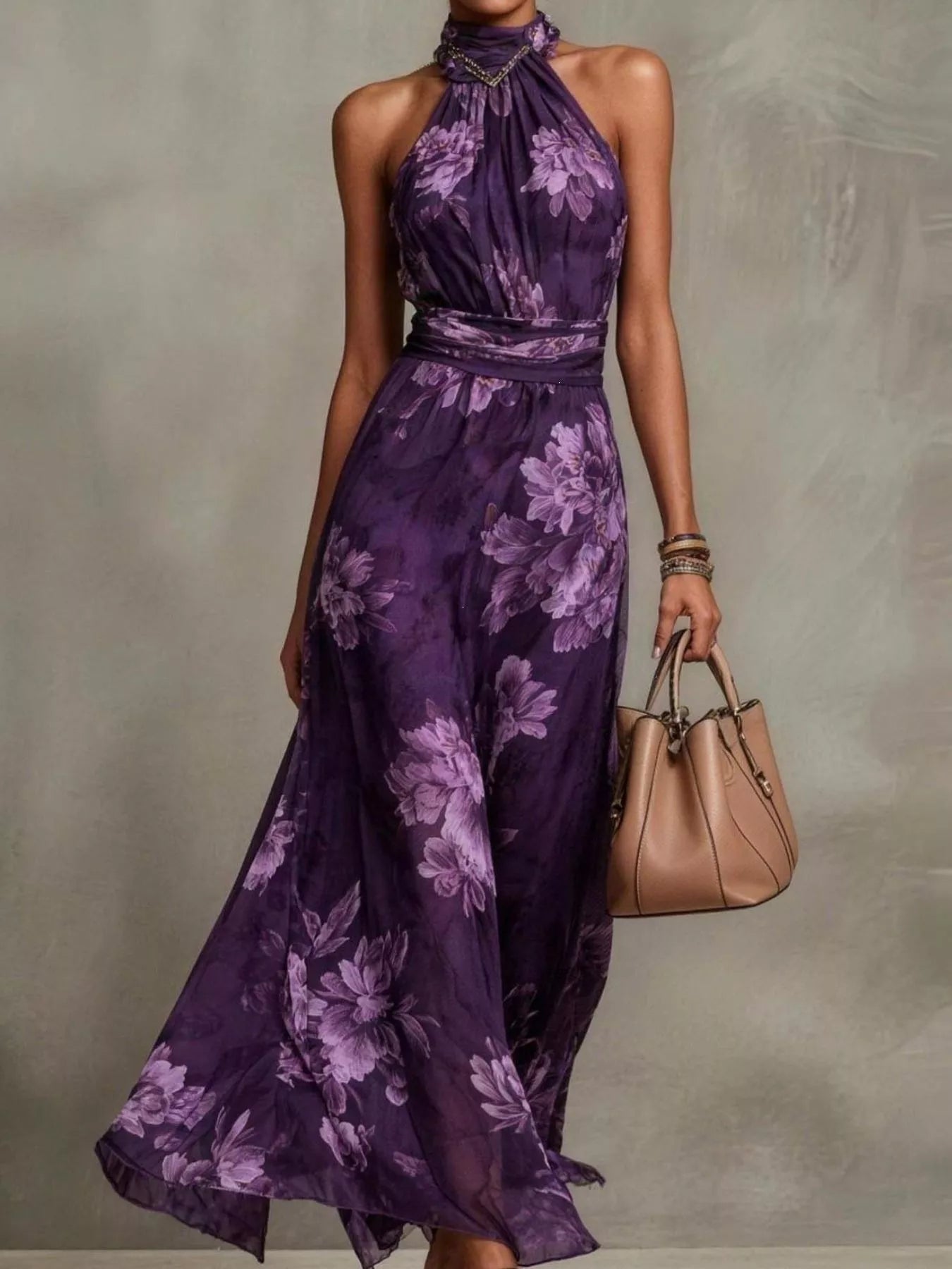 Plus size floral print sleeveless maxi dress from Trendsi, flowing fabric with vibrant floral pattern, perfect for summer wear.