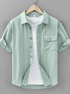 Men's plus size button-up short sleeve shirt by Shopimist, shown with a classic collar and lightweight fabric in natural colors.