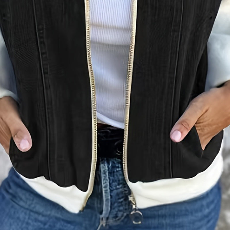 Women's denim patchwork zip-up jacket by FitiqueFit, casualwear style with mixed fabric patches and front zipper closure.