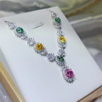 Sterling silver necklace with a 3.5 carat moissanite gemstone, featuring a delicate chain and sparkling center stone.