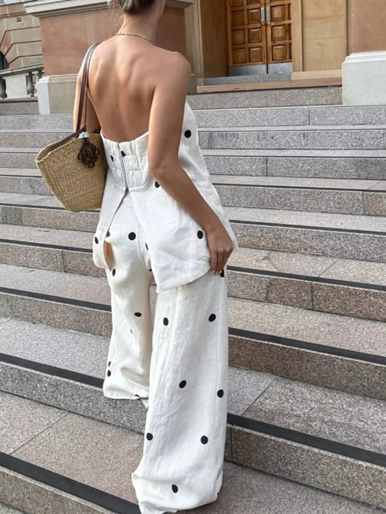 Polka dot tube top and pants set by Plush Fashion Hub, stylish two-piece outfit with a matching polka dot pattern.