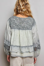 Polished Shopimist washed layered lace pintuck flared woven blouse with intricate lace details and a flowing silhouette.
