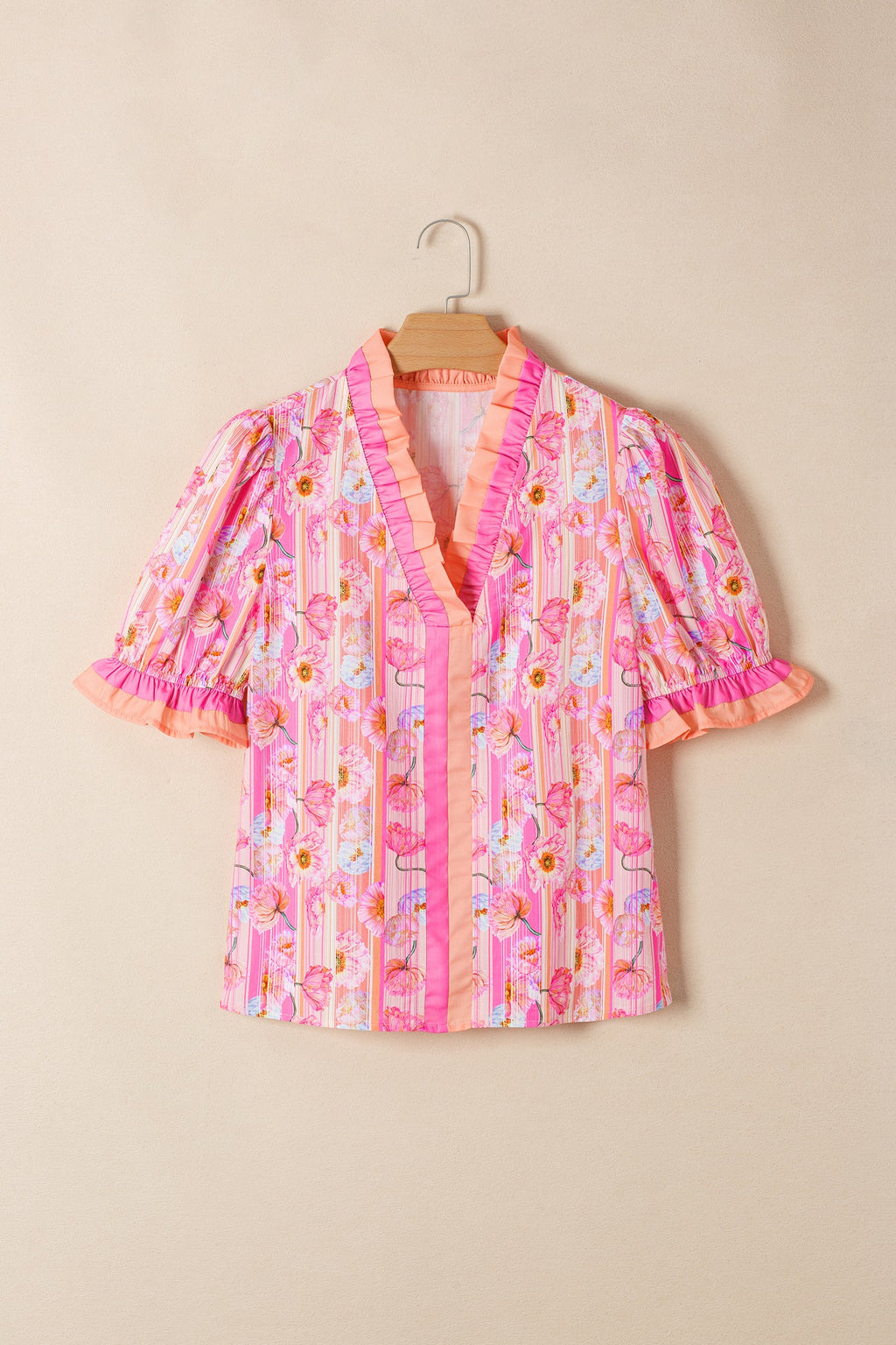 Danna Trim Short Sleeve Blouse by Threaded Pear featuring a stylish design and trim details, shown in a close-up image.