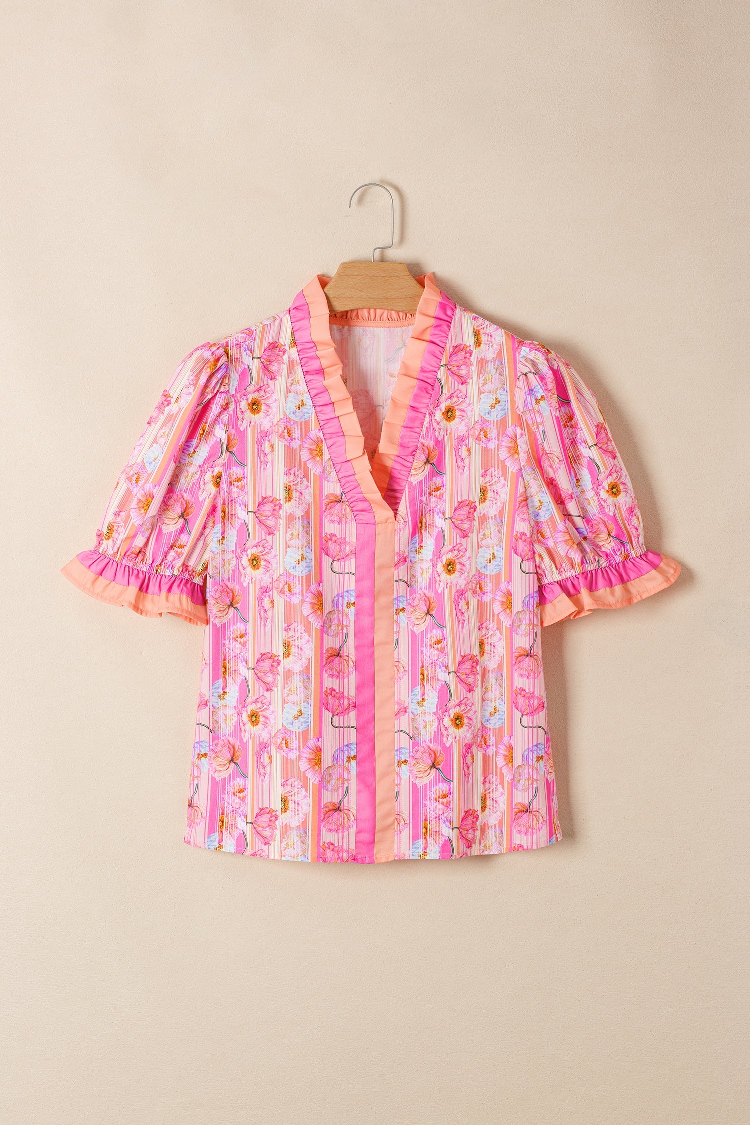 Danna Trim Short Sleeve Blouse by Threaded Pear featuring a stylish design and trim details, shown in a close-up image.