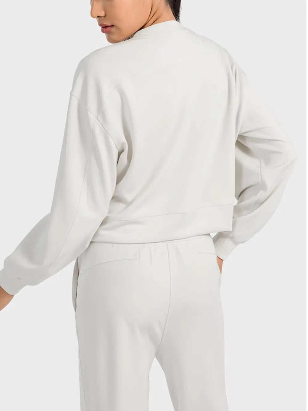 Plush Fashion Hub Millennia round neck drop shoulder sports top in soft fabric, designed for comfortable activewear.