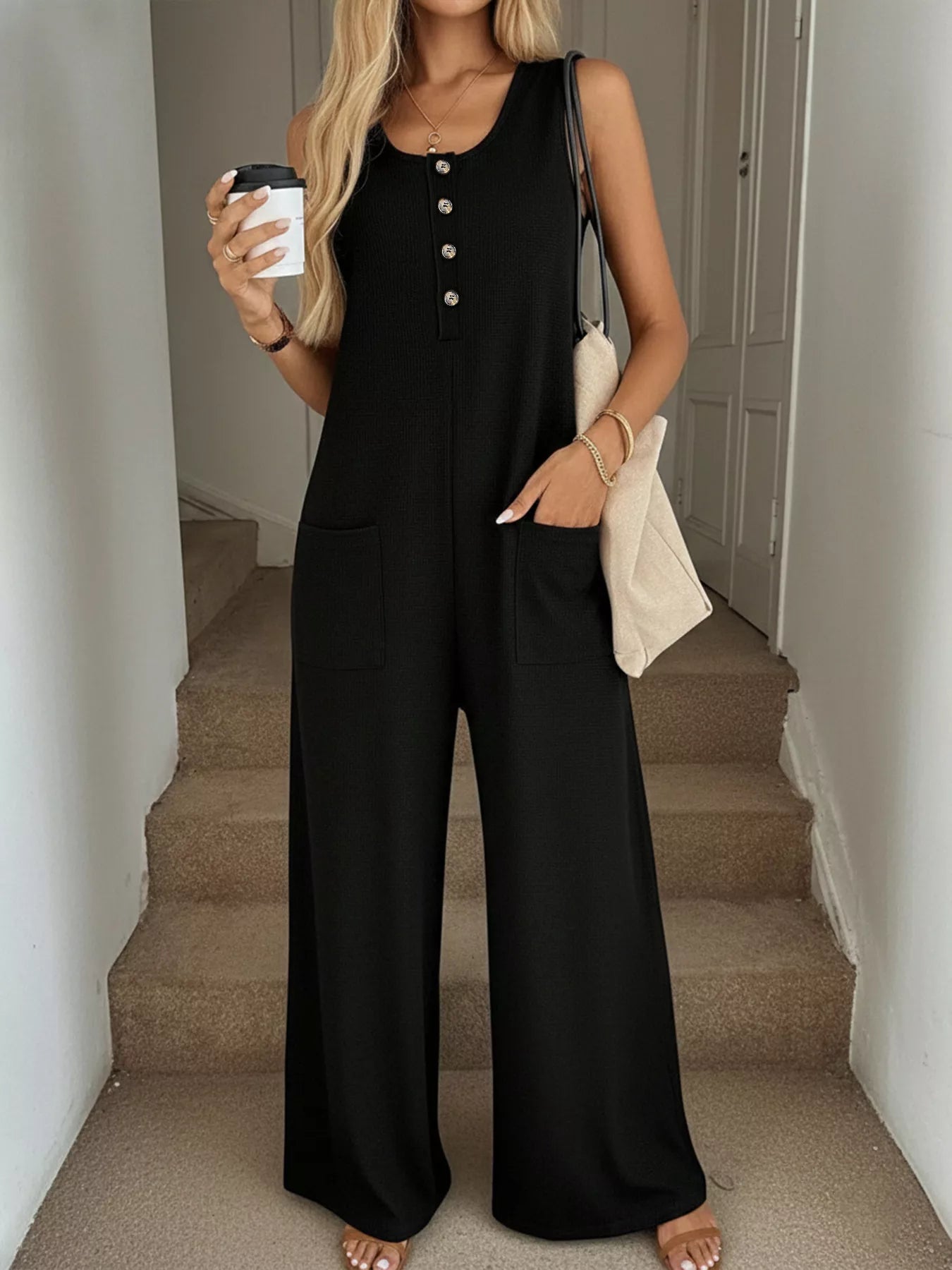 Plush Fashion Hub sleeveless button-front wide-leg jumpsuit with a comfortable, chic design and relaxed fit.