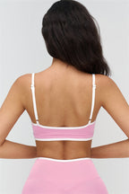 Fitglutes activewear sports bra and leggings 2-piece set in contrasting colors, designed for gym workouts and active wear.