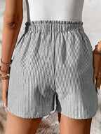 Women's striped elastic waist drawstring shorts by Plush Fashion Hub, casual summer beachwear bottoms with a relaxed fit.