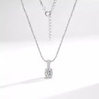 Sterling silver moissanite necklace with 1-carat center stone, elegant jewelry piece by Shopimist, showcasing the sparkling gemstone.