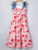 Floral print tie-shoulder midi dress with pockets, lightweight summer dress by Trendsi, featuring a flowy fit and vibrant floral design.