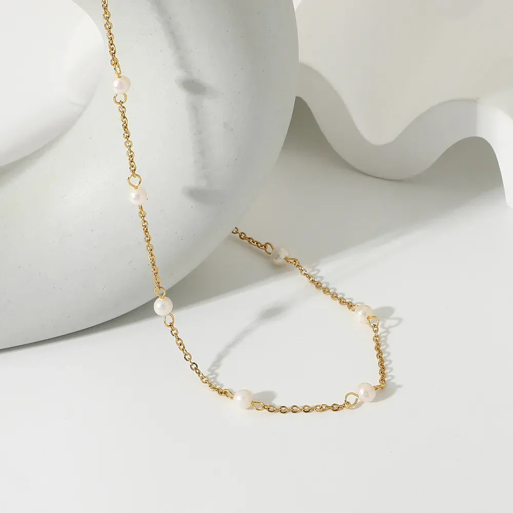 18K gold-plated freshwater pearl necklace with a delicate strand of lustrous pearls on a fine chain