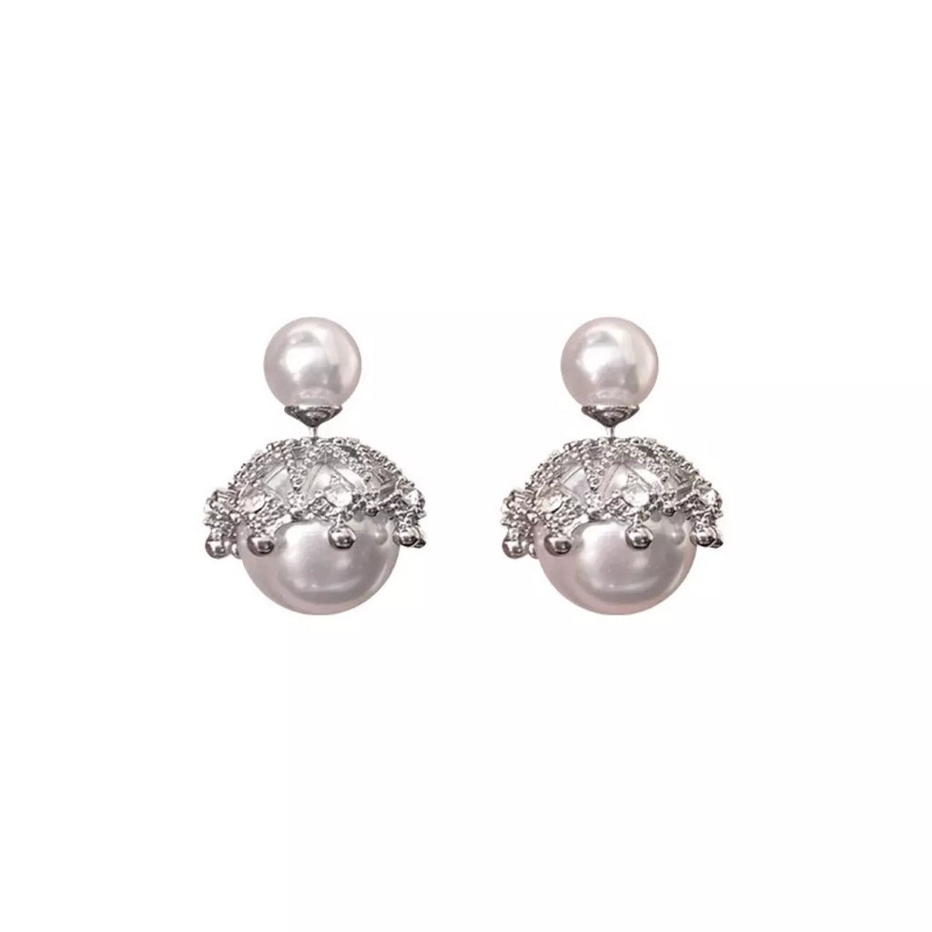 Shopimist pearl stud earring featuring a classic round white pearl set in a simple metal post for elegant wear