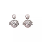 Shopimist pearl stud earring featuring a classic round white pearl set in a simple metal post for elegant wear
