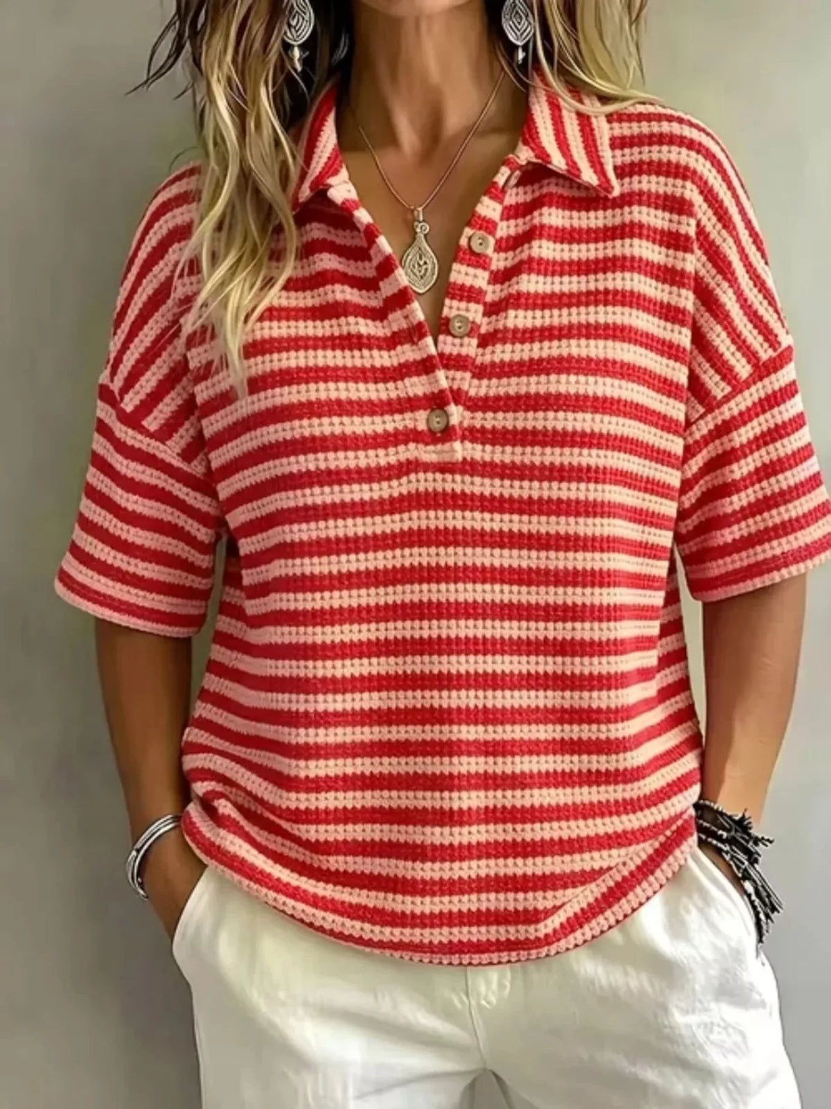 Plus size contrast striped knit polo shirt for women, featuring a stylish design and full-coverage fit, from Trendsi.