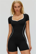 Fitglutes Activewear The Whisper Romper shown on a model, featuring a sleek, form-fitting gym and workout romper in breathable fabric.