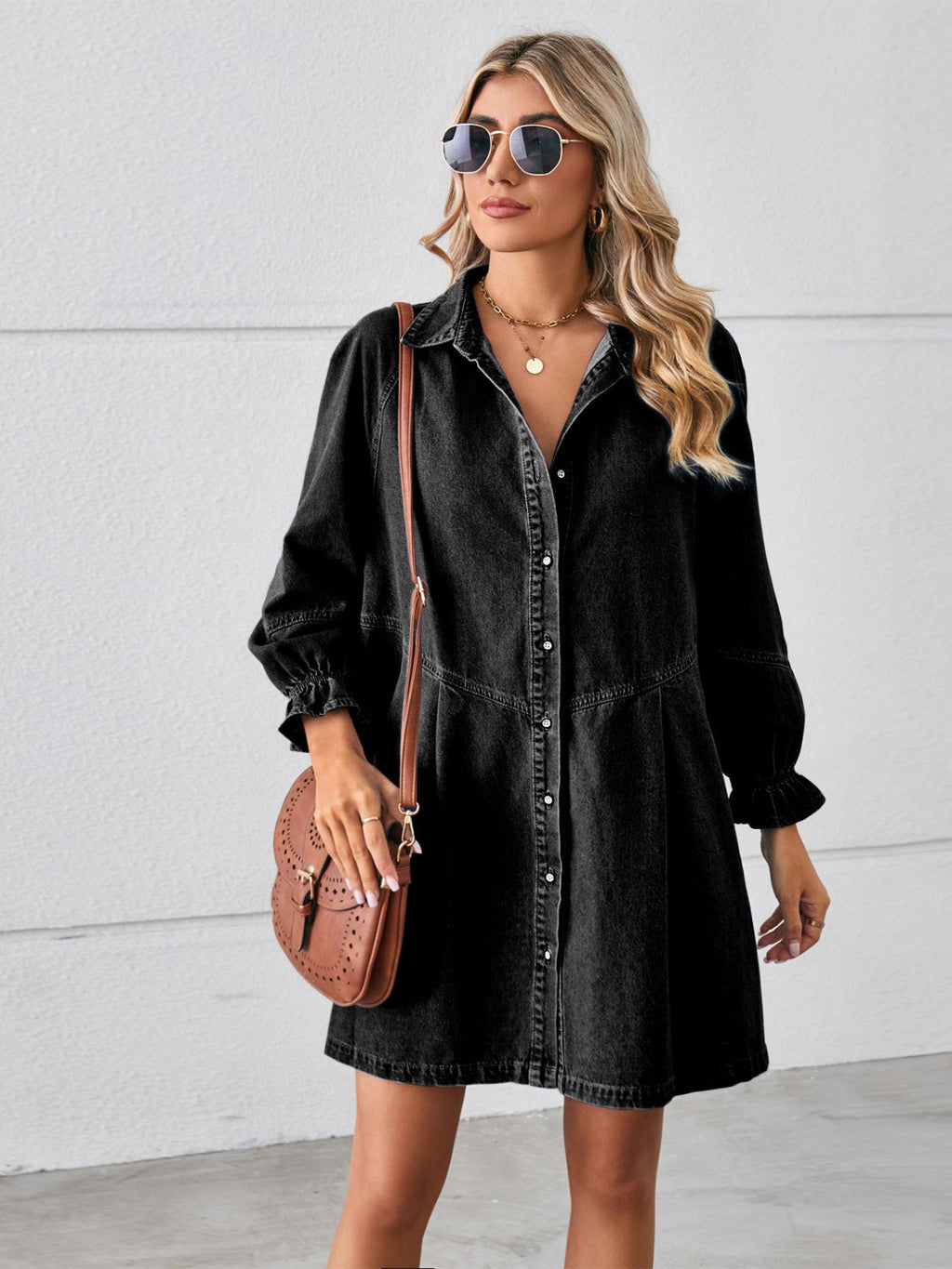 VYSN button-up mini denim dress with flounce sleeves, shown hanging on a hanger with front buttons and a fitted silhouette.