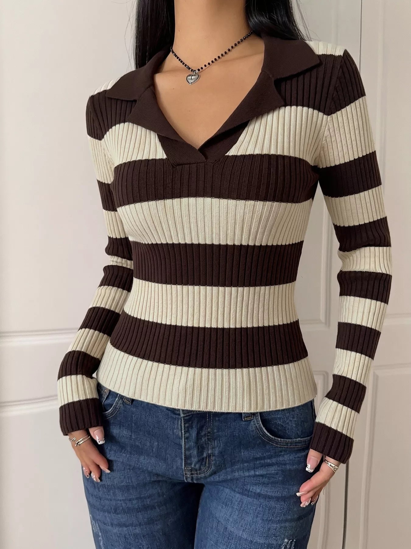 Striped ribbed knit long sleeve sweater shirt from Plush Fashion Hub, featuring a cozy, fitted design with bold stripes.