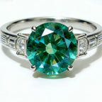 Sterling silver ring with an 8-carat moissanite gemstone, showcasing a sparkling and elegant jewelry piece.