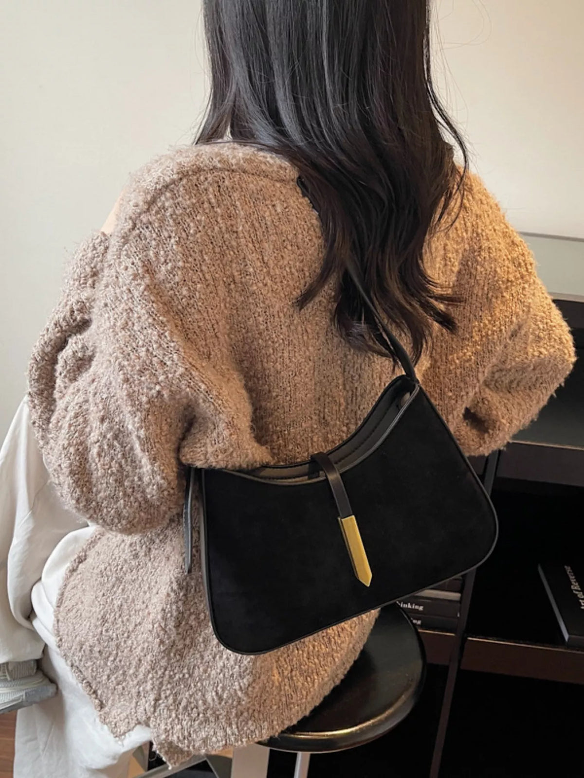Adjustable strap shoulder bag from Plush Fashion Hub, featuring a stylish design and spacious interior for everyday use.
