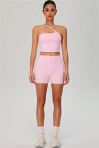Fitglutes activewear one-shoulder crop top and shorts 2-piece set, featuring a stylish workout outfit for gym and sports activities.