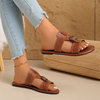 Shopimist buckled leather slide sandals with wide straps and a comfortable flat sole, perfect for casual summer wear.