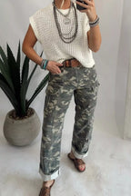 Camouflage print women's denim pants by Shopimist with multiple pockets and a stylish, casual fit.