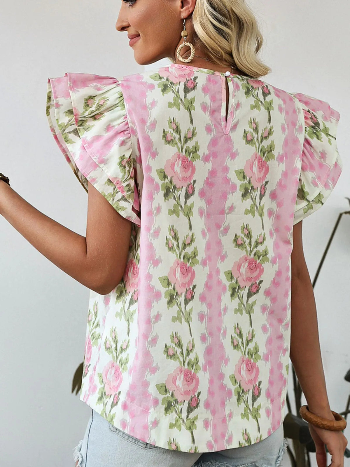 Floral print ruffled sleeve blouse by Plush Fashion Hub featuring a feminine design and lightweight fabric.