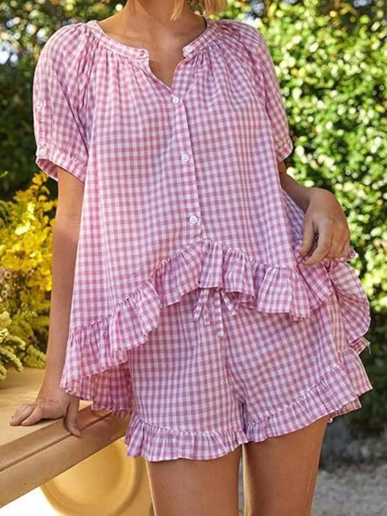 Gingham ruffle trim top and shorts set by Trendsi, featuring a coordinated matching design with ruffle details.
