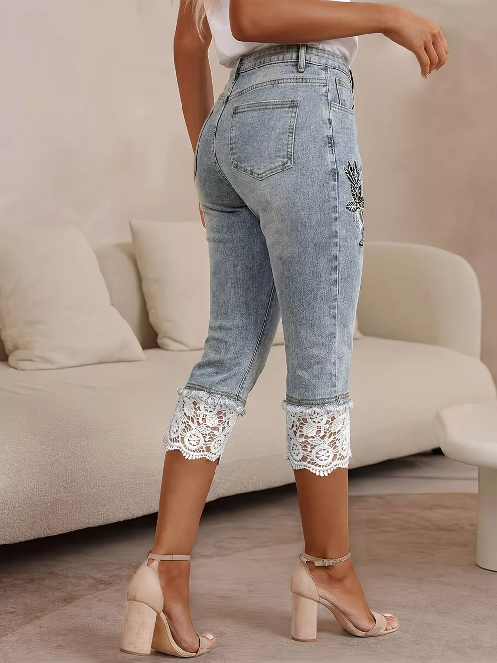 Lace trimmed Capri jeans by Shopimist featuring classic denim with delicate lace accents at the hem and a slim fit style.
